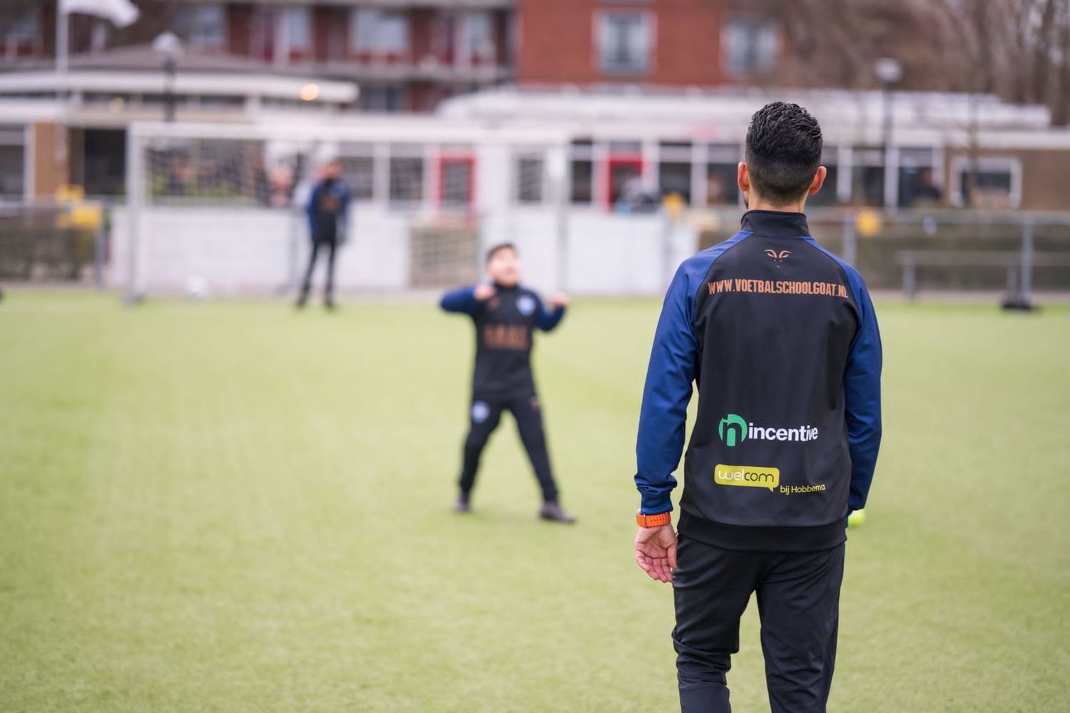 G.O.A.T. coach and brand sponsors